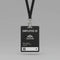 Black plastic employee ID card with white text on a black lanyard and metal clasp