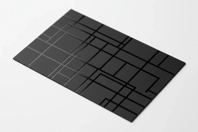Black business card with geometric spot UV gloss design on white background