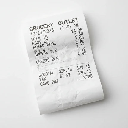 Thermal paper printed receipt on white background, grocery purchase details visible