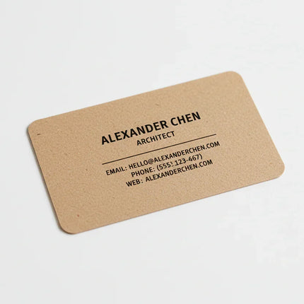 Rectangular kraft business card with rounded corners and black minimalist text on white background.