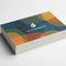Stack of colorful business cards on natural textured stock with geometric design