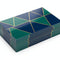 Stack of custom printed business cards with geometric design, glossy coating on white background