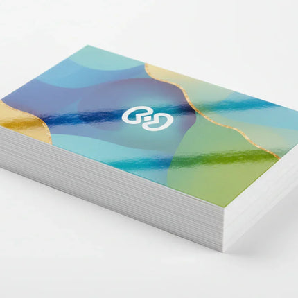 Stack of colorful rectangular business cards on 16pt cardstock with aqueous coating