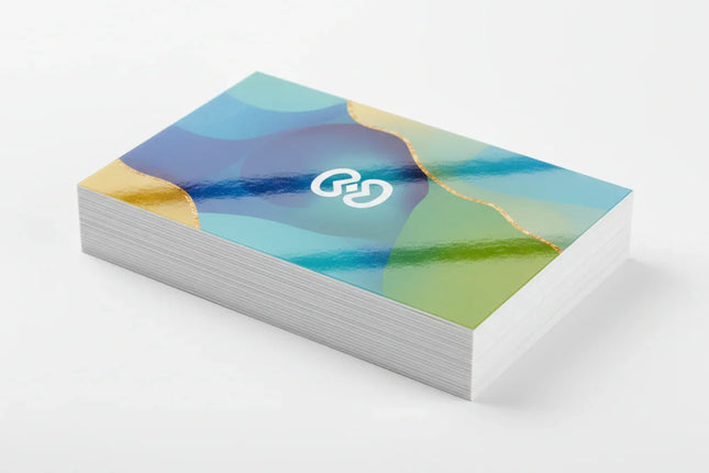 Stack of colorful rectangular business cards on 16pt cardstock with aqueous coating