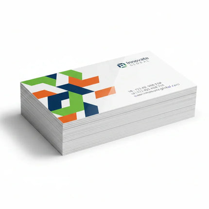 Stack of color printed rectangular business cards on white background, 14pt UV coated stock