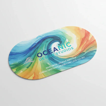 Oval-shaped business card with colorful abstract design on a white background