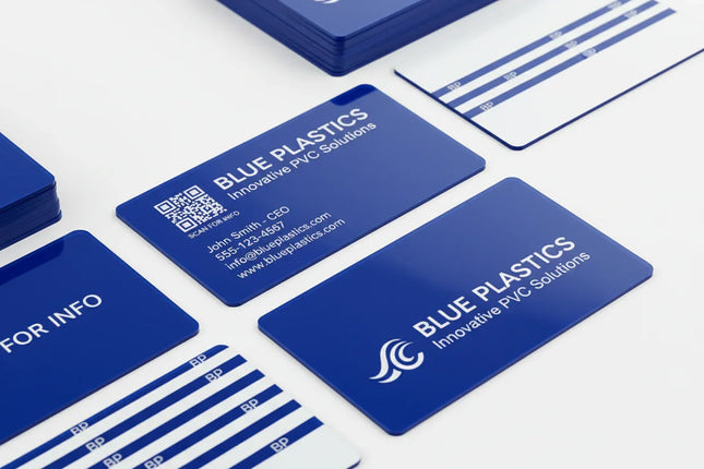 Blue PVC business cards with white printing displayed on a white background