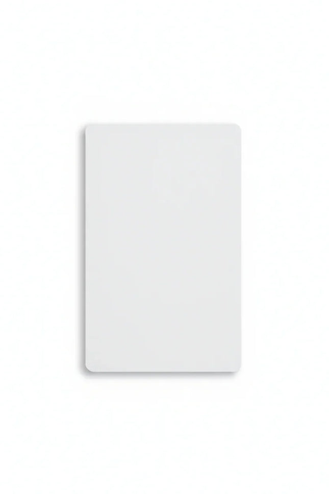 Blank white plastic card, credit card size, with rounded corners on white background