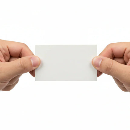 Two hands pulling a tearproof synthetic business card on a white background